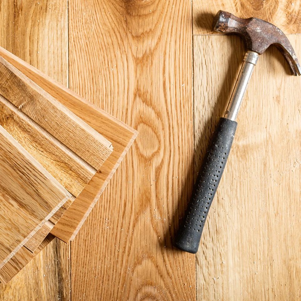 Hammer on the hardwood planks